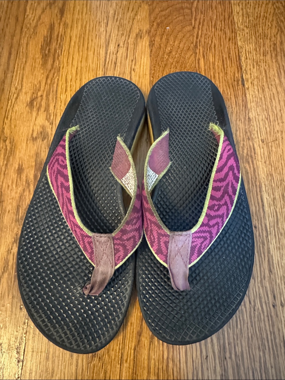Chaco Women's Black Footbed Flip Flops with Pink Patterned Straps